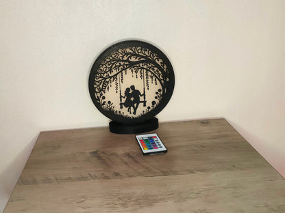Lampe Couple sur balançoire